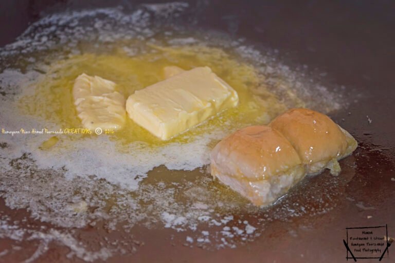 Close-up of pav being toasted with butter at Sardar Pav Bhaji, Tardeo, Mumbai — an iconic restaurant dish.