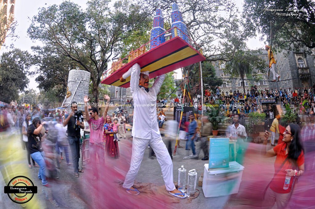 Mumbai’s Dabbawala performance at Kala Ghoda Arts Festival — capturing the city’s rhythm, community spirit, and the heartbeat of cultural motion.
© Humayun Peerzaada — All photos captured with heart and lens.